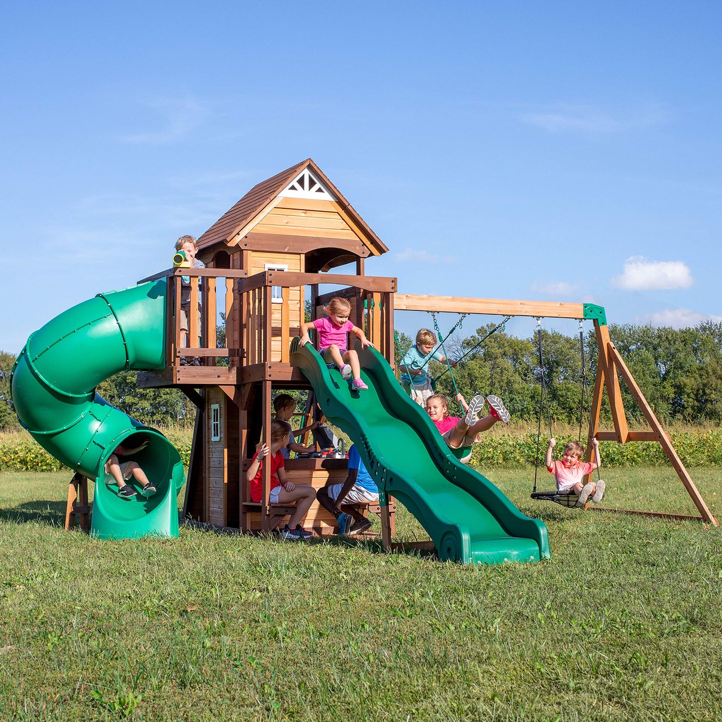 Backyard Discovery Cedar Cove Wood Swing Set with Spiral Tube and Wave Slide, Clubhouse, Toy Grill, Snack Bar, Rock Wall, Belt Swings, Web Swing, Balcony,Chalkboard, Ladder,Outdoor Playset 10 Years