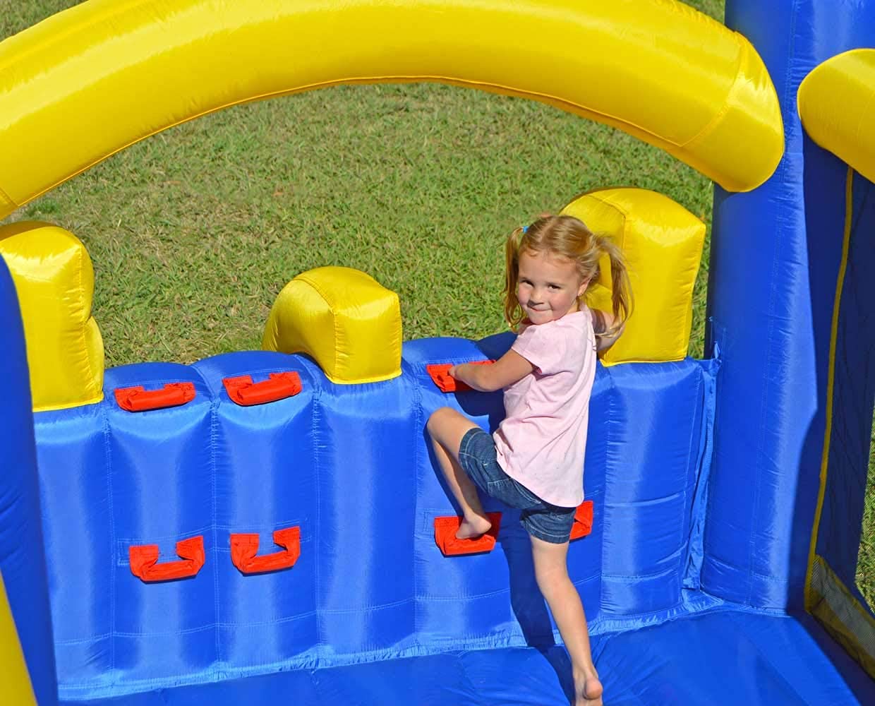 Island Hopper Racing Slide and Slam Inflatable Bounce House – Dual Slides, Climbing Wall & Basketball Hoop for Fun – Jumper for Kids with Durable PVC Build – Outdoor/Indoor Bounce House for Big Kids