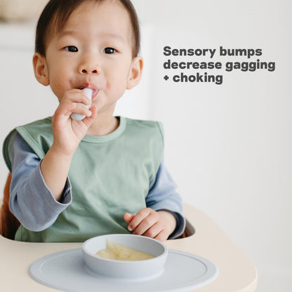 ezpz Tiny Spoon (2 Pack in Blue) - 6 Months+ - 100% Silicone Spoon for Baby Led Weaning + Purees - Designed by a Pediatric Feeding Specialist - Shower Essentials & Gifts