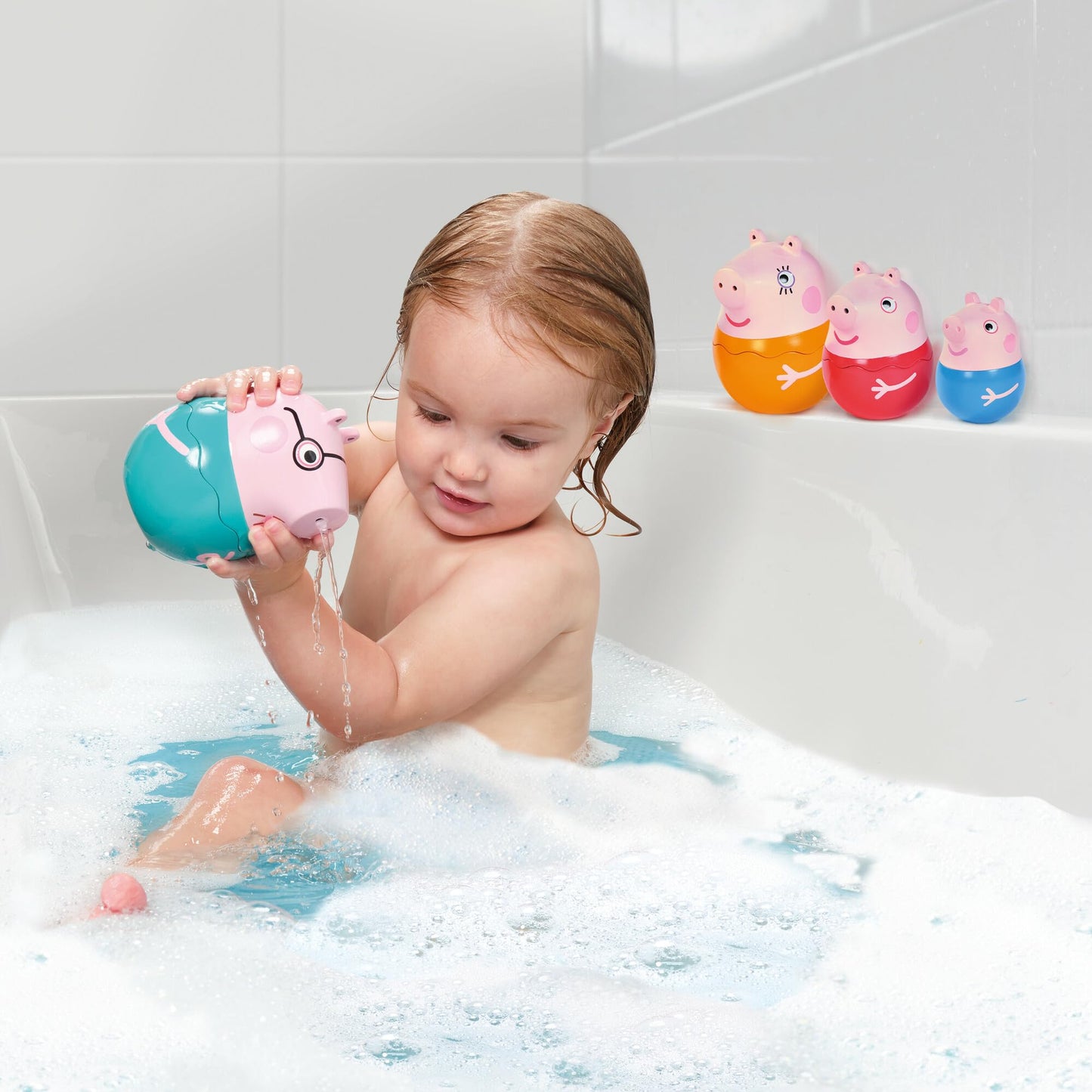 TOMY Toomies Peppa Pig - Peppa’s Nesting Family - Includes Peppa Pig, Mummy Pig, Daddy Pig and George - Nesting, Sorting & Pouring Toy - Ages 18 Months and Up