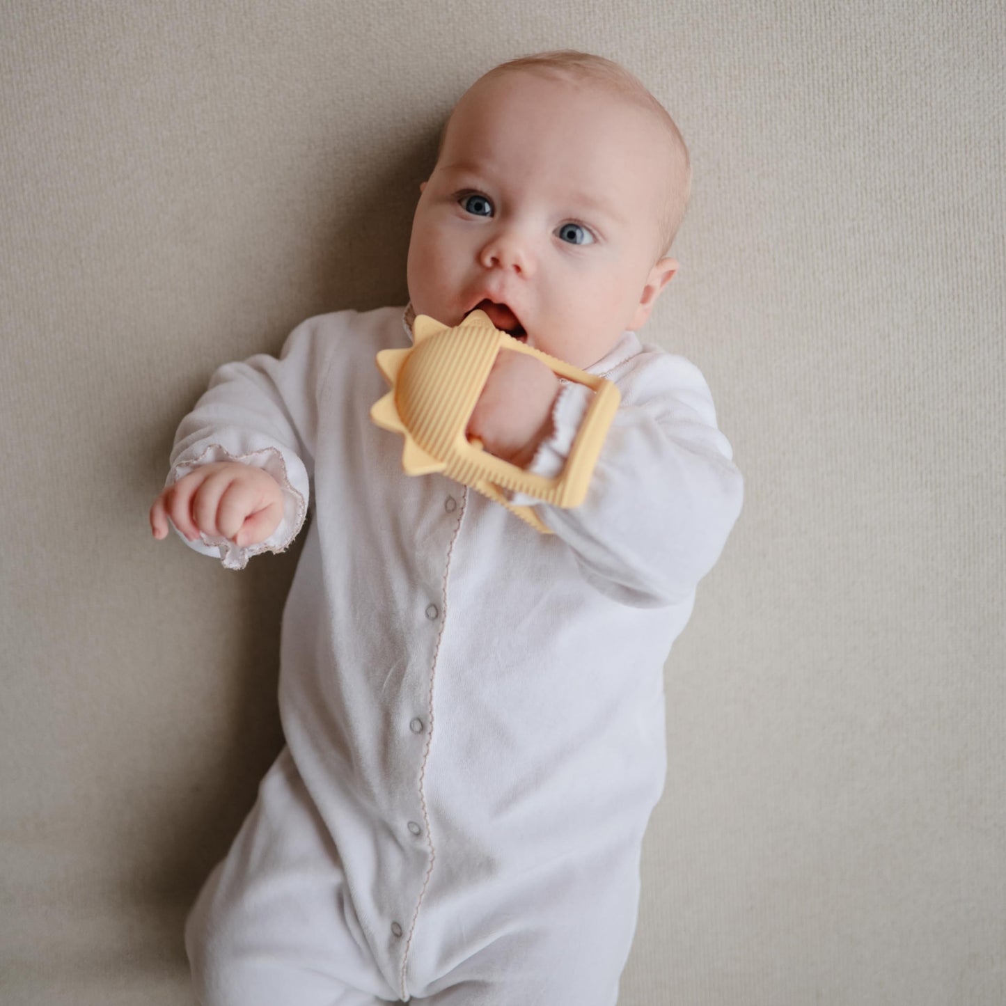 mushie Silicone Baby No-Drop Sun Teether Toy