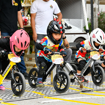 Strider 12” Sport Bike, Black - No Pedal Balance Bicycle for Kids 1 to 4 Years - Includes Safety Pad, Padded Seat, Mini Grips & Flat-Free Tires - Tool-Free Assembly & Adjustments